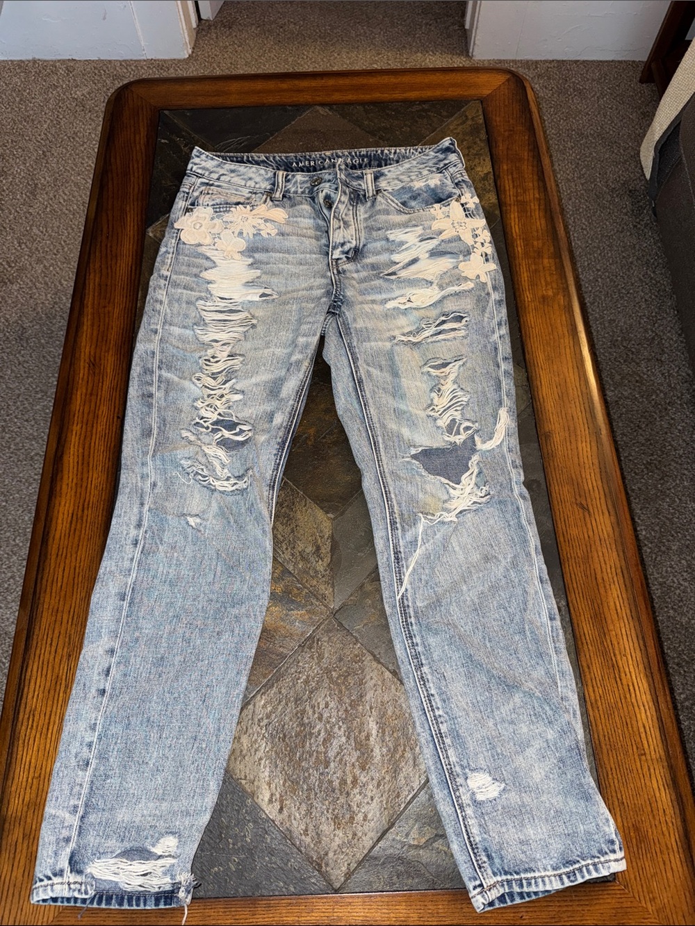 American Eagle Light Wash Distressed Jeans with White Lace Patches